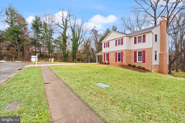 view of front facade featuring a front yard