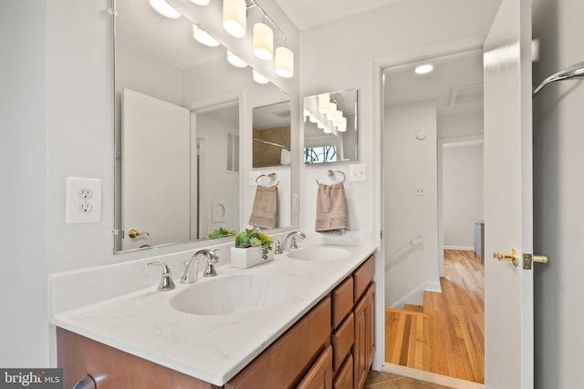 bathroom featuring vanity and wood-type flooring