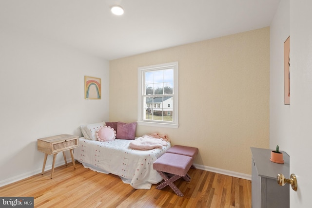 bedroom with light hardwood / wood-style flooring