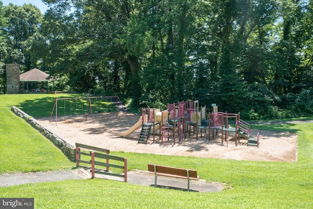 view of playground featuring a lawn