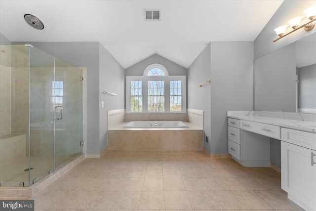 full bathroom featuring visible vents, a garden tub, vaulted ceiling, vanity, and a shower stall