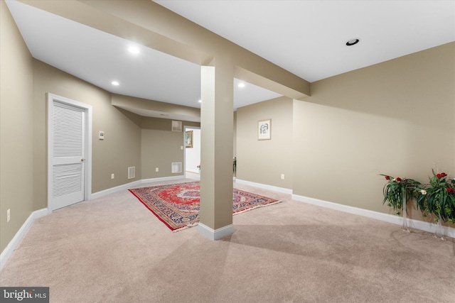 finished below grade area featuring baseboards, carpet flooring, and recessed lighting