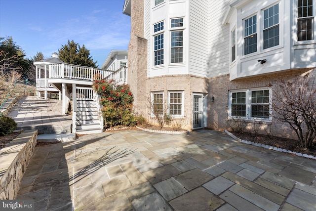 view of patio with stairway