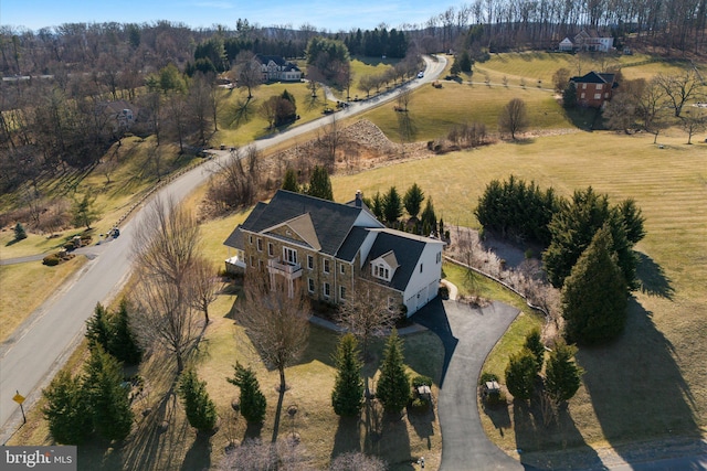 birds eye view of property featuring a rural view