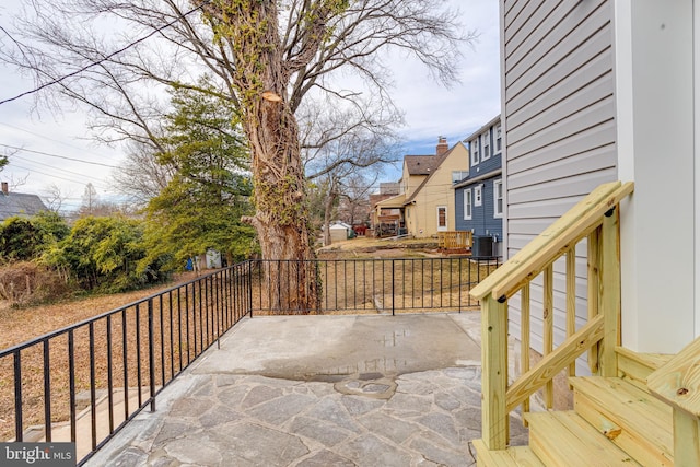 view of patio with central AC unit