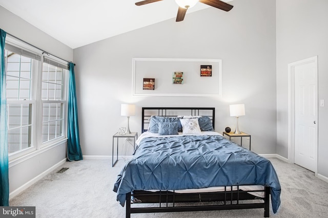 carpeted bedroom featuring vaulted ceiling and ceiling fan