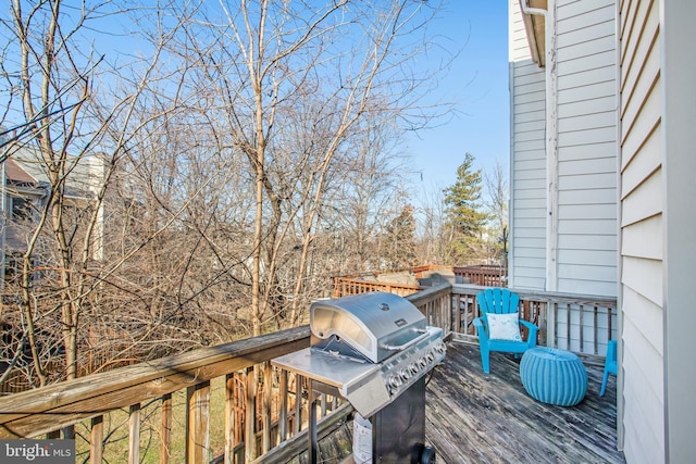 wooden terrace with grilling area