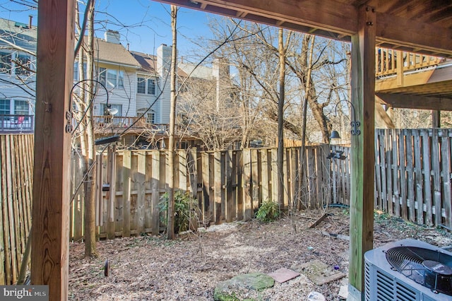 view of yard featuring central air condition unit