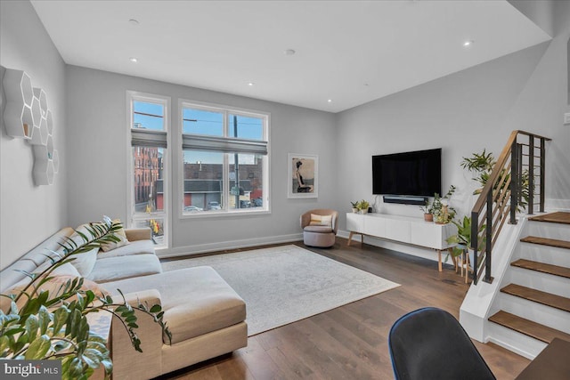 living room with dark hardwood / wood-style floors