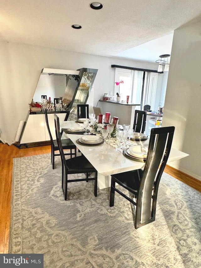 dining area featuring hardwood / wood-style floors