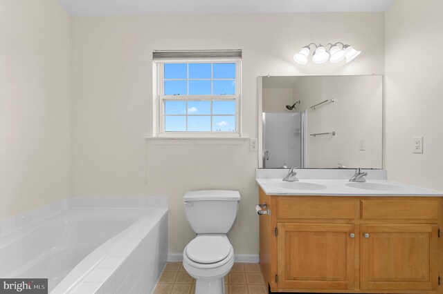 full bathroom with vanity, plus walk in shower, and toilet