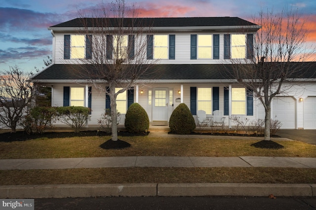 view of front of home with a garage