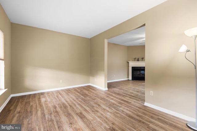 unfurnished room featuring wood-type flooring