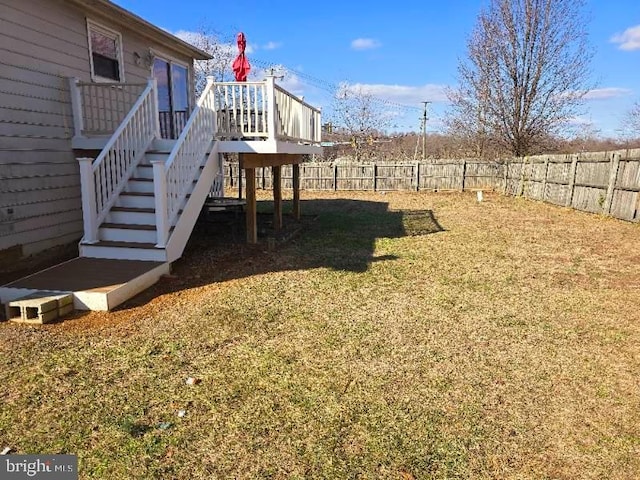 view of yard featuring a wooden deck