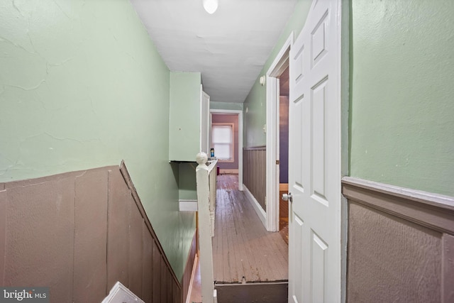 corridor featuring hardwood / wood-style flooring