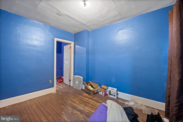 empty room featuring hardwood / wood-style floors