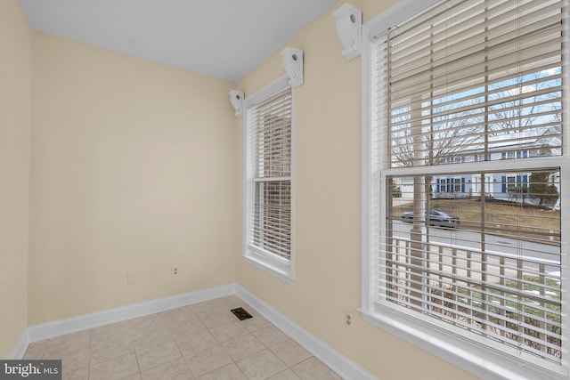 view of tiled spare room