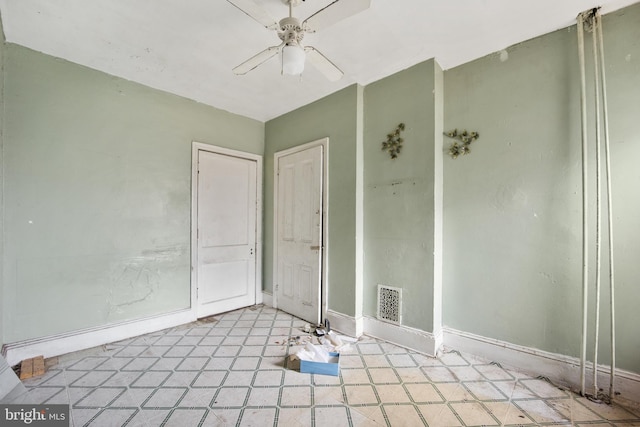 empty room with ceiling fan