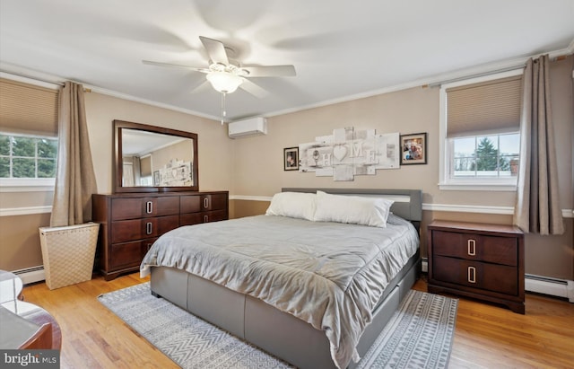 bedroom with multiple windows, light wood-type flooring, and a wall unit AC