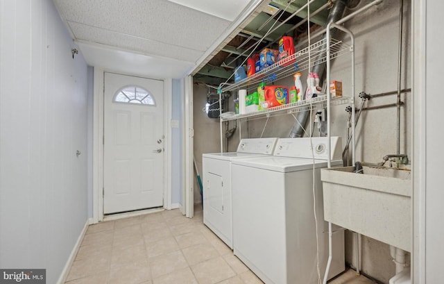 laundry area featuring independent washer and dryer