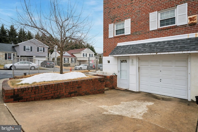 exterior space featuring a garage