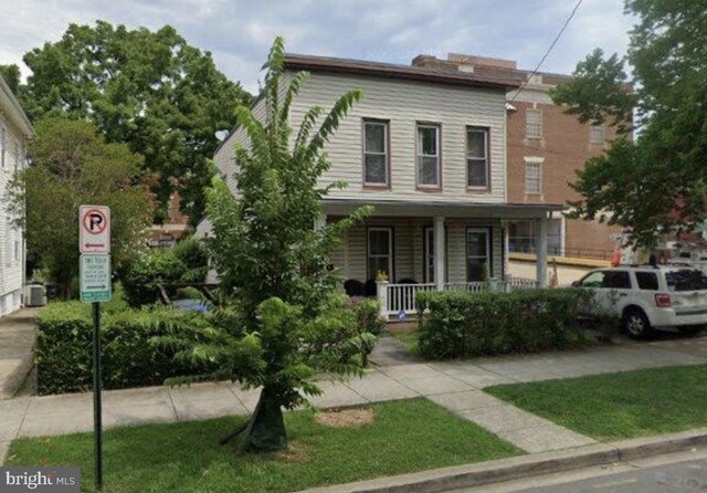 view of front of home featuring covered porch