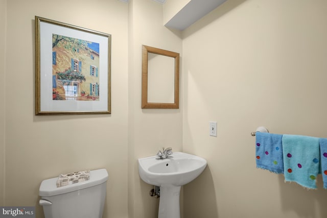 bathroom featuring toilet