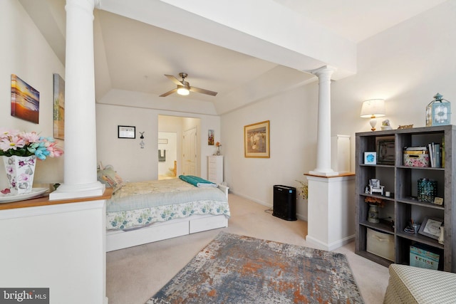 carpeted bedroom with ornate columns