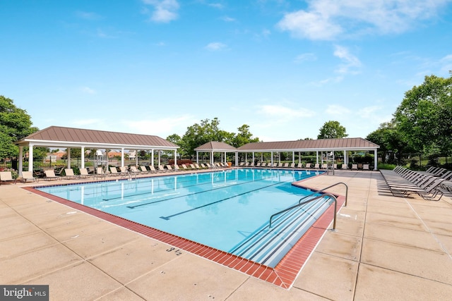 view of pool with a gazebo and a patio area