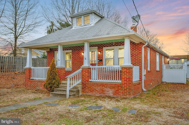 bungalow-style house with covered porch