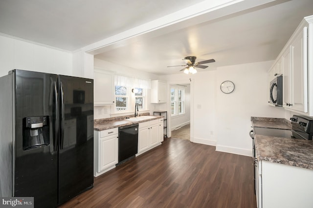 kitchen with sink, white cabinetry, dark hardwood / wood-style flooring, ceiling fan, and black appliances