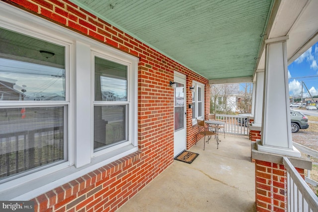 view of patio featuring a porch