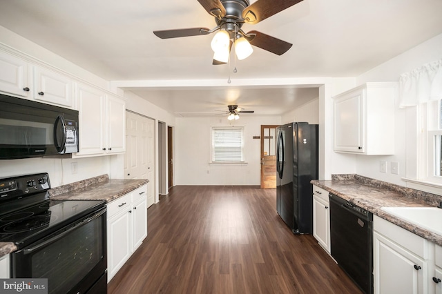 kitchen featuring white cabinetry, dark hardwood / wood-style floors, sink, and black appliances