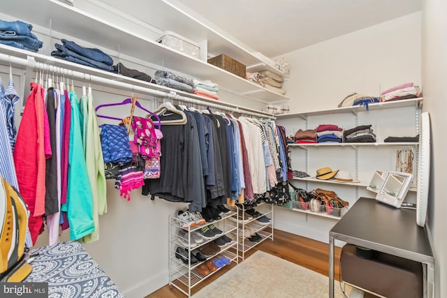 walk in closet featuring hardwood / wood-style flooring