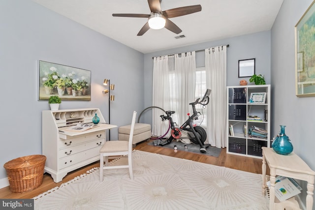 office space featuring ceiling fan and hardwood / wood-style floors