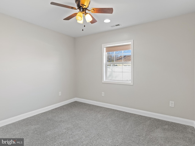 unfurnished room featuring carpet floors and ceiling fan