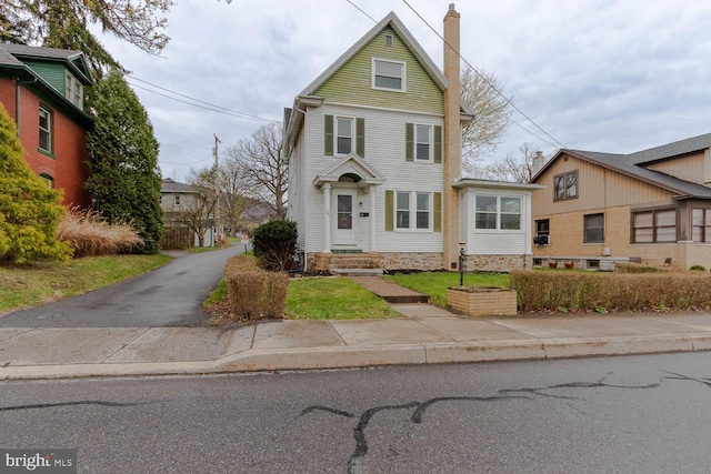 264 S Main St, Pleasant Gap, PA 16823 - view of front of home with a chimney