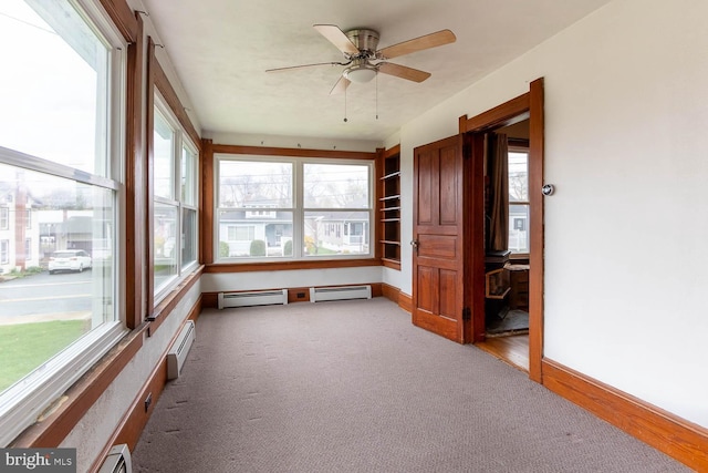 264 S Main St, Pleasant Gap, PA 16823 - unfurnished sunroom featuring carpet floors, a wealth of natural light, and baseboards