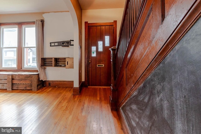 264 S Main St, Pleasant Gap, PA 16823 - interior space featuring wood-type flooring, arched walkways, a wealth of natural light, and stairway