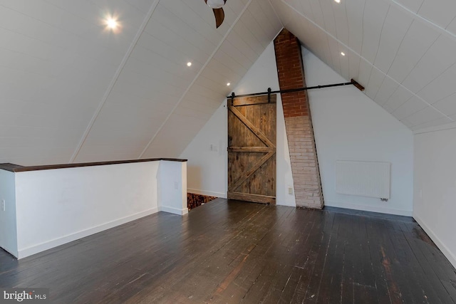 264 S Main St, Pleasant Gap, PA 16823 - additional living space with a barn door, baseboards, radiator, lofted ceiling, and wood-type flooring