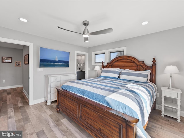 bedroom featuring wood-type flooring and ceiling fan