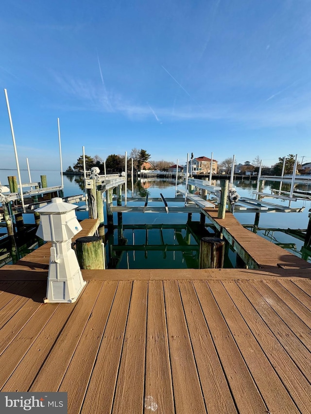 view of dock with a water view