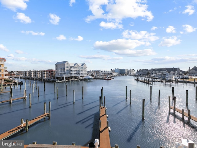 view of dock with a water view