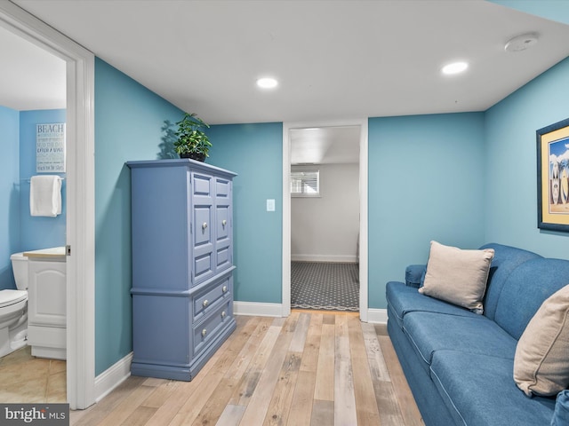 living area with light hardwood / wood-style floors