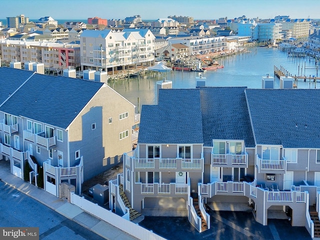 drone / aerial view with a water view