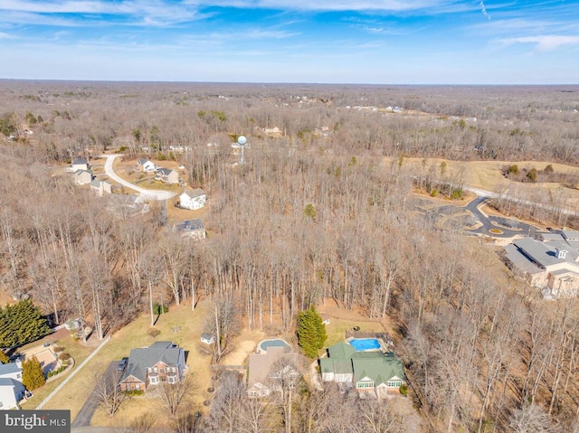 aerial view with a wooded view