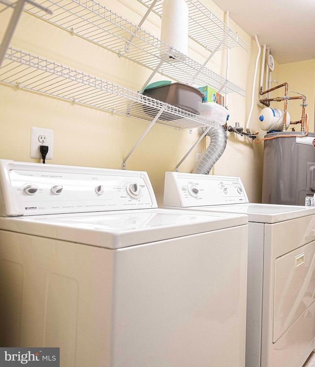 washroom with separate washer and dryer