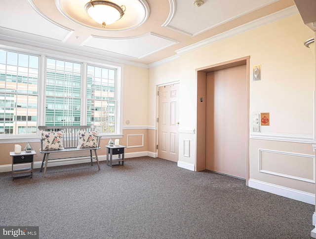 sitting room with ornamental molding, carpet floors, and elevator