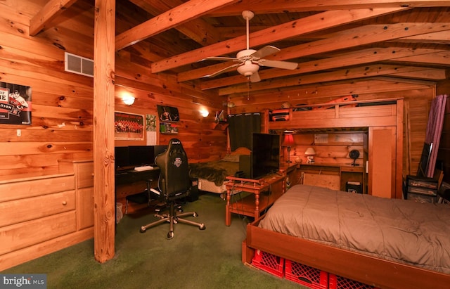 carpeted bedroom featuring beamed ceiling and wooden walls