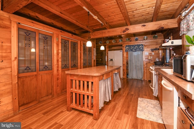 kitchen featuring wood ceiling, beam ceiling, light hardwood / wood-style flooring, and pendant lighting